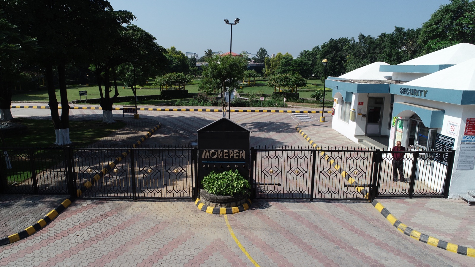 Main gate and security post of Morepen Village