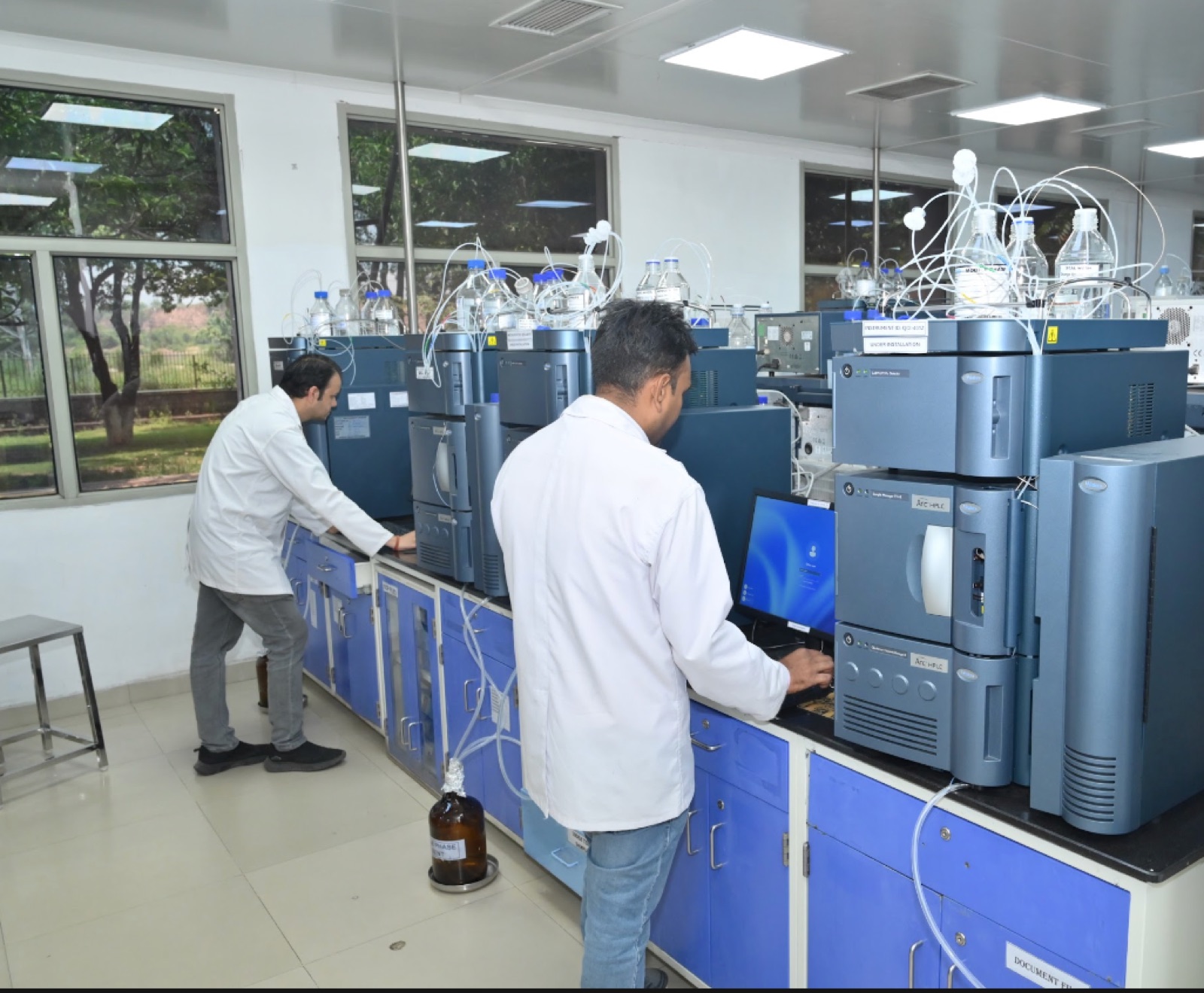 Morepen analysts running HPLC systems in the R&D laboratory